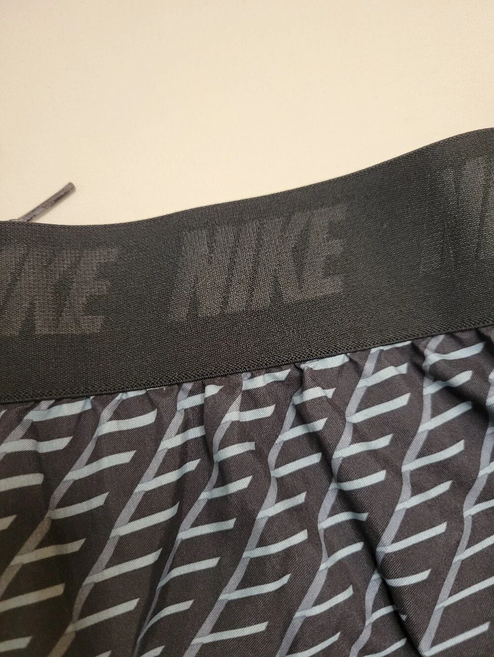 Nike Men's Blue and Black Diagonal Stripe Swim Trunks